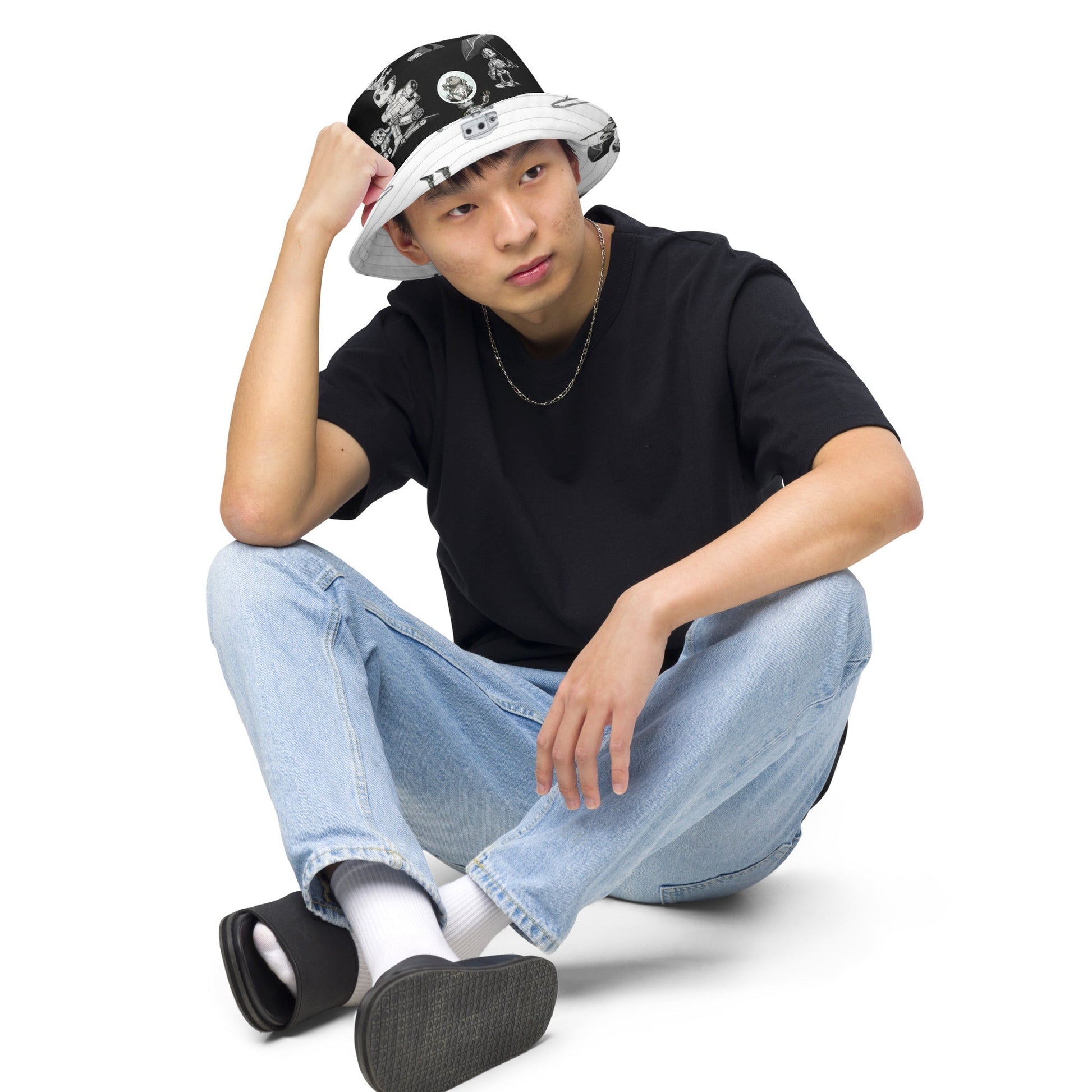 Reversible moisture-wicking fabric bucket hat by Bolt Voltage worn by model.