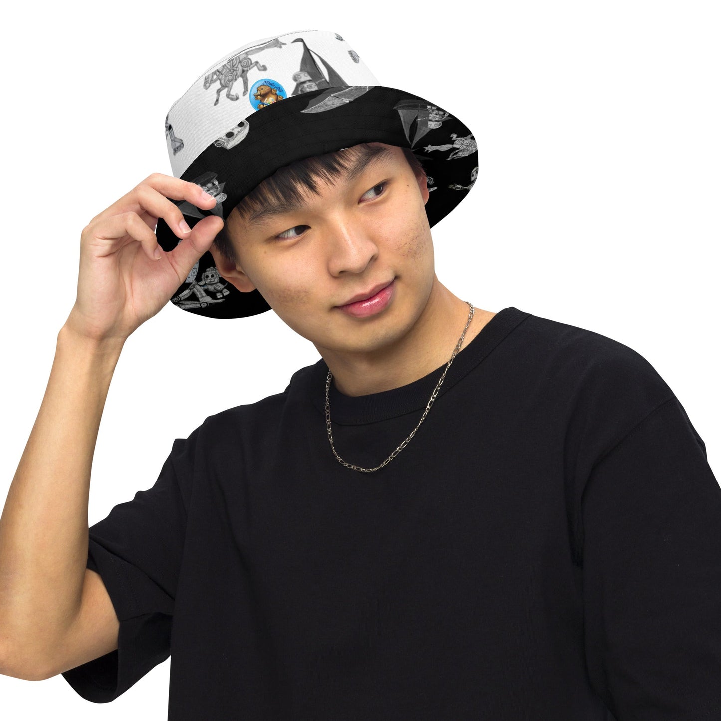 Reversible bucket hat with moisture-wicking fabric, featuring futuristic design and breathable material, worn by a model.