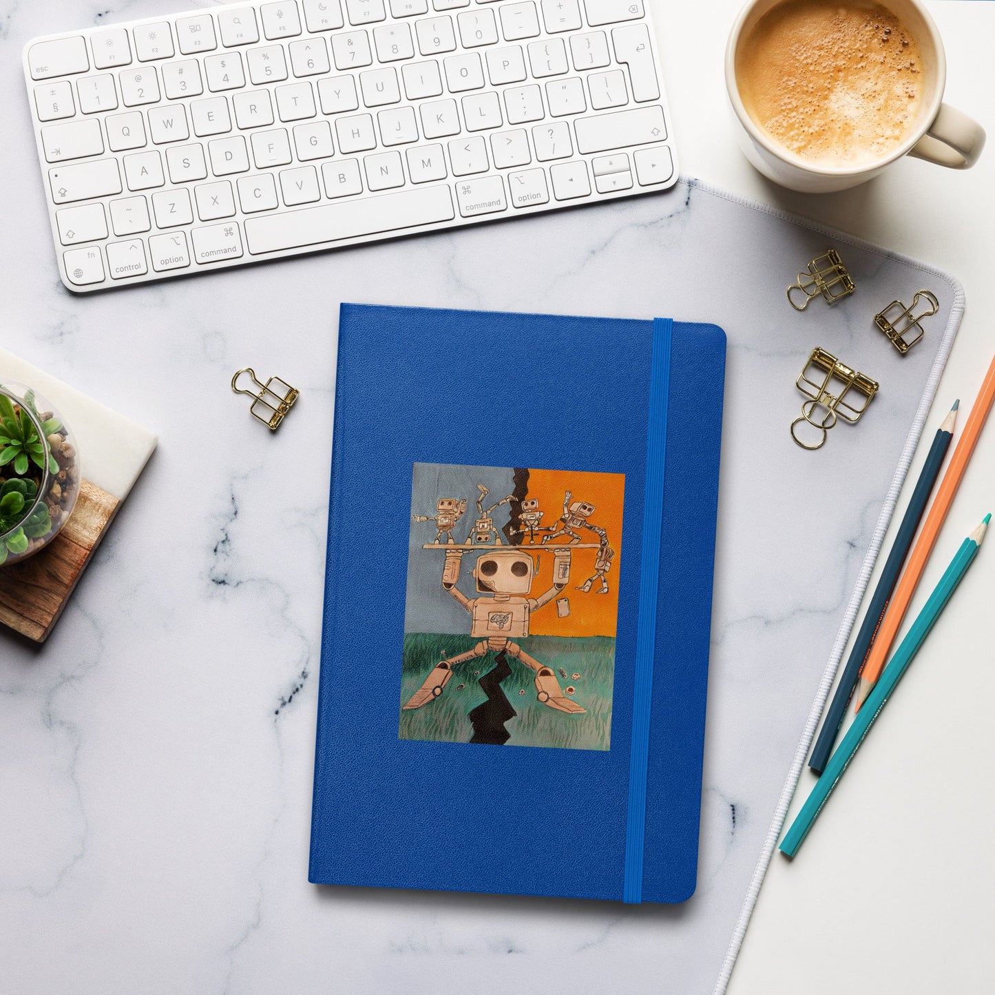 Hardcover bound journal with blue elastic closure and unique cover design, perfect for note-taking and organizing ideas.