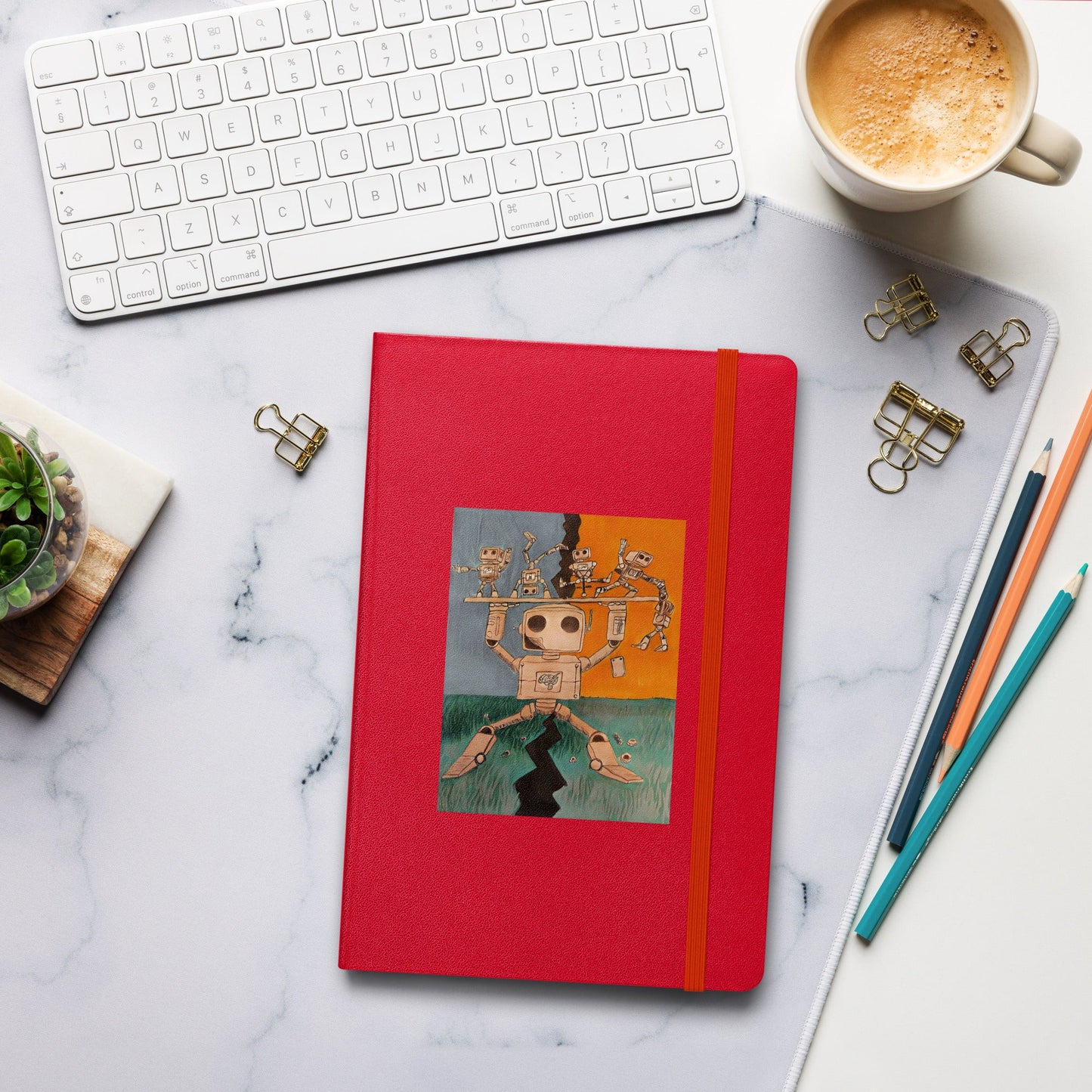 Hardcover journal with elastic closure and ribbon marker, titled "Keeping it all together," ideal for notes and ideas.