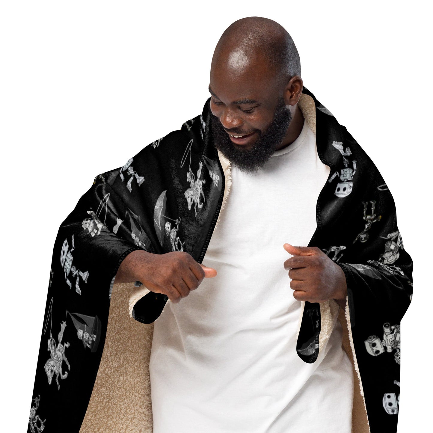Sherpa blanket draped over person, showcasing plush black surface with soft interior.